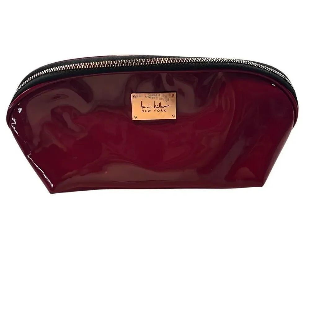 Nicole Miller, New York burgundy patent leather make up bag beautiful